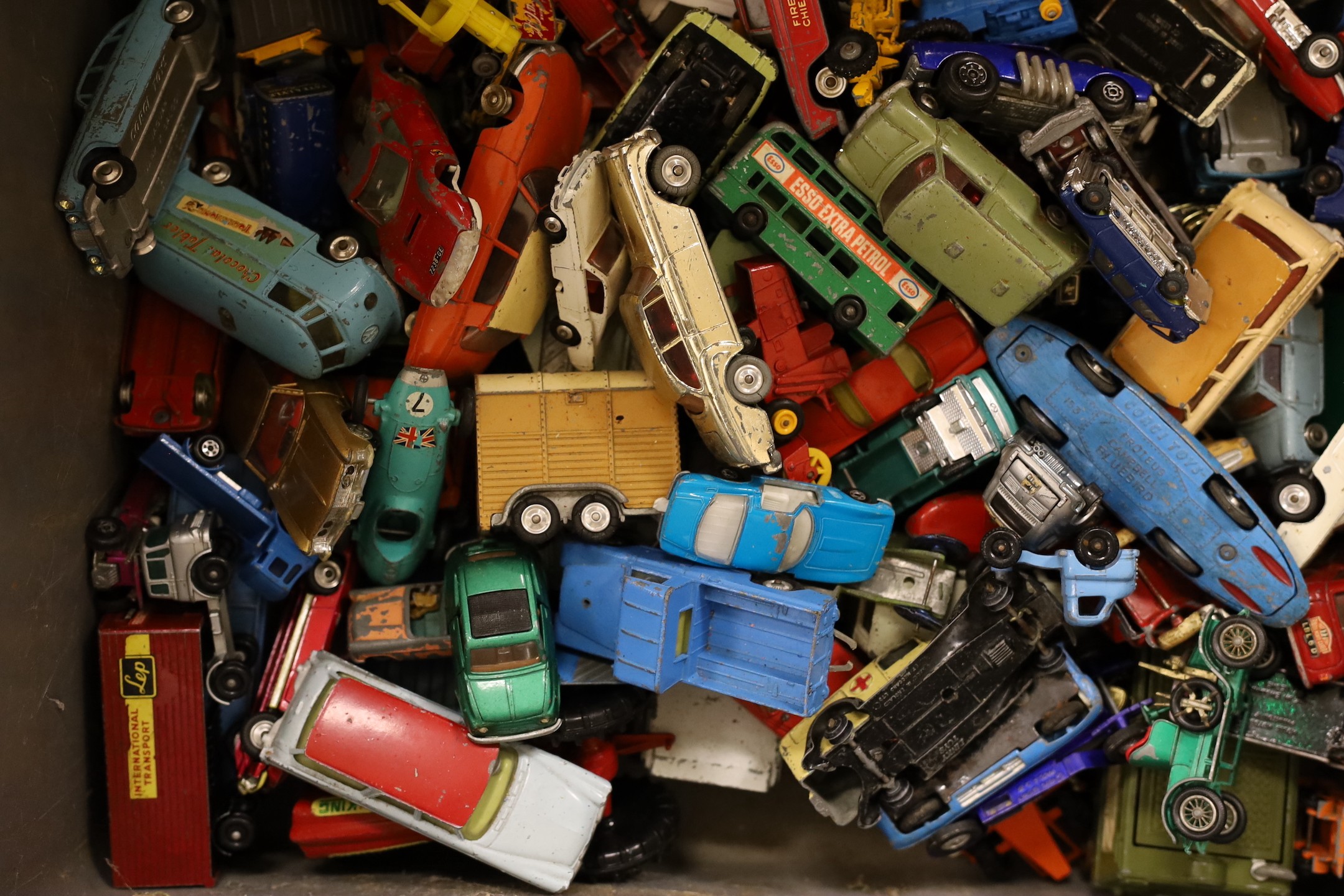 A large collection of used mixed die-cast toys